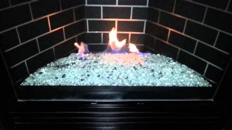 changing gas fireplace logs to ceramic rocks